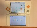 BARDZO ŁADNA KONSOLA NEW NINTENDO 2DS XL BIAŁO-POMARAŃCZKOWA - KOMPLET