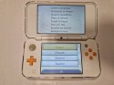 KONSOLA NEW NINTENDO 2DS XL BIAŁO-POMARAŃCZKOWA + RYSIK