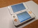 KONSOLA NEW NINTENDO 2DS XL BIAŁO-POMARAŃCZKOWA + RYSIK