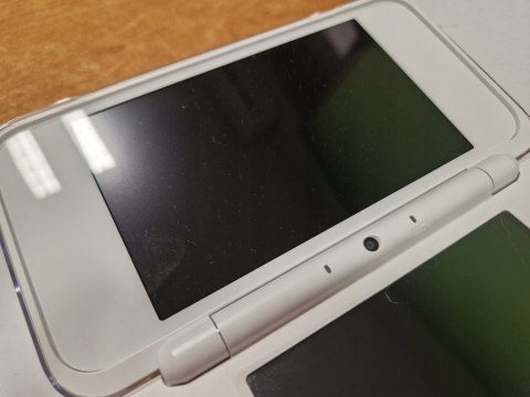 KONSOLA NEW NINTENDO 2DS XL BIAŁO-POMARAŃCZKOWA + RYSIK