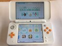 ŁADNA KONSOLA NEW NINTENDO 2DS XL BIAŁO-POMARAŃCZKOWA + RYSIK