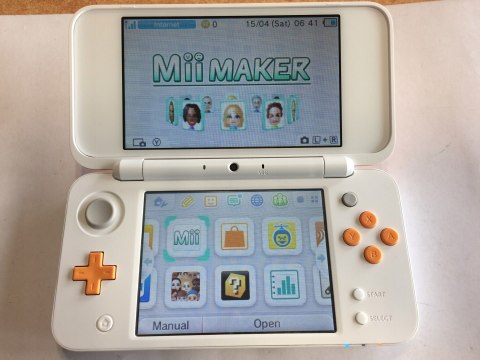 ŁADNA KONSOLA NEW NINTENDO 2DS XL BIAŁO-POMARAŃCZKOWA + RYSIK