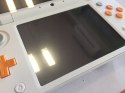 ŁADNA KONSOLA NEW NINTENDO 2DS XL BIAŁO-POMARAŃCZKOWA + RYSIK