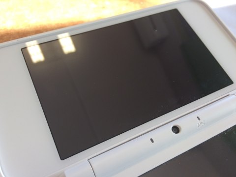 ŁADNA KONSOLA NEW NINTENDO 2DS XL BIAŁO-POMARAŃCZKOWA + RYSIK