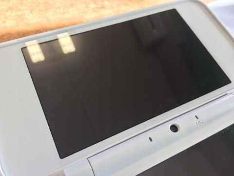ŁADNA KONSOLA NEW NINTENDO 2DS XL BIAŁO-POMARAŃCZKOWA + RYSIK
