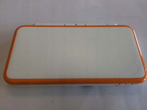 ŁADNA KONSOLA NEW NINTENDO 2DS XL BIAŁO-POMARAŃCZKOWA + RYSIK