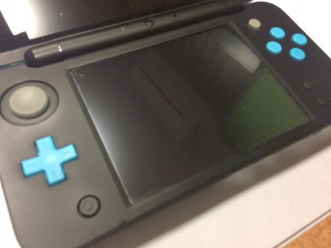 KONSOLA NEW NINTENDO 2DS XL NIEBIESKO-CZARNA + ŁADOWARKA + PUDEŁKO