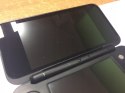 KONSOLA NEW NINTENDO 2DS XL NIEBIESKO-CZARNA + ŁADOWARKA + PUDEŁKO