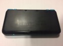 KONSOLA NEW NINTENDO 2DS XL NIEBIESKO-CZARNA + ŁADOWARKA + PUDEŁKO