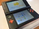KONSOLA NEW NINTENDO 3DS XL POMARAŃCZOWO-CZARNA + ETUI PIKACHU + RYSIK +ŁAD