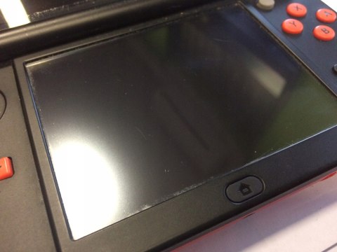 KONSOLA NEW NINTENDO 3DS XL POMARAŃCZOWO-CZARNA + ETUI PIKACHU + RYSIK +ŁAD