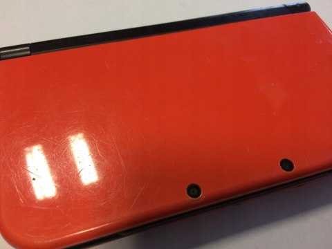 KONSOLA NEW NINTENDO 3DS XL POMARAŃCZOWO-CZARNA + ETUI PIKACHU + RYSIK +ŁAD