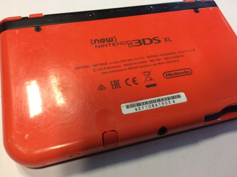 KONSOLA NEW NINTENDO 3DS XL POMARAŃCZOWO-CZARNA + ETUI PIKACHU + RYSIK +ŁAD