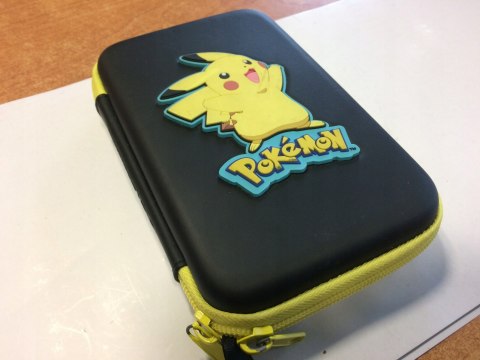 KONSOLA NEW NINTENDO 3DS XL POMARAŃCZOWO-CZARNA + ETUI PIKACHU + RYSIK +ŁAD