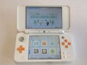 KONSOLA NEW NINTENDO 2DS XL BIAŁO-POMARAŃCZKOWA + +RYSIK