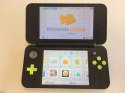 KONSOLA NEW NINTENDO 2DS XL CZARNO-ZIELONA + RYSIK + ŁADOWARKA