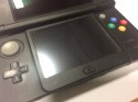 KONSOLA NEW NINTENDO 3DS CZARNA + 4 GRY + COVER PLATE' ALA DREWNO + PUDEŁKO