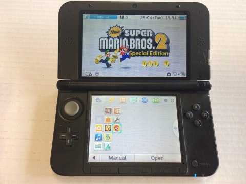 KONSOLA NINTENDO 3DS XL CZERWONA + PUDEŁKO + GRA NEW SUPER MARIO 2