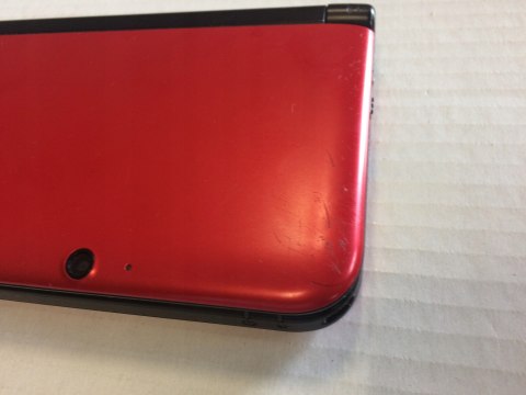 KONSOLA NINTENDO 3DS XL CZERWONA + PUDEŁKO + GRA NEW SUPER MARIO 2