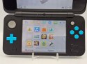 IDEALNA KONSOLA NEW NINTENDO 2DS XL NIEBIESKO-CZARNA + RYSIK + PUDEŁKO
