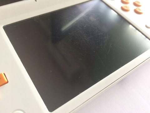 KONSOLA NEW NINTENDO 2DS XL BIAŁO-POMARAŃCZKOWA + RYSIK + ETUI