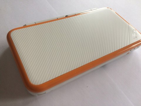 KONSOLA NEW NINTENDO 2DS XL BIAŁO-POMARAŃCZKOWA + RYSIK + ETUI