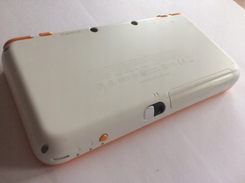KONSOLA NEW NINTENDO 2DS XL BIAŁO-POMARAŃCZKOWA + RYSIK + ETUI