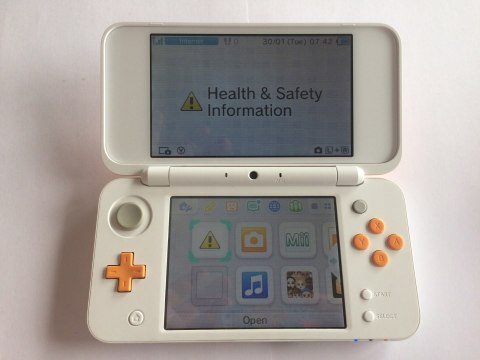 KONSOLA NEW NINTENDO 2DS XL BIAŁO-POMARAŃCZKOWA + RYSIK + PUDEŁKO