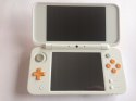 KONSOLA NEW NINTENDO 2DS XL BIAŁO-POMARAŃCZKOWA + RYSIK + PUDEŁKO