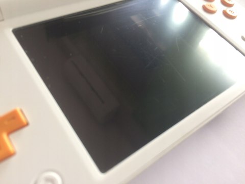 KONSOLA NEW NINTENDO 2DS XL BIAŁO-POMARAŃCZKOWA + RYSIK + PUDEŁKO