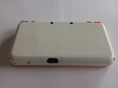 KONSOLA NEW NINTENDO 2DS XL BIAŁO-POMARAŃCZKOWA + RYSIK + PUDEŁKO