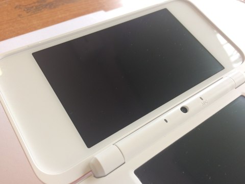 KONSOLA NEW NINTENDO 2DS XL BIAŁO-POMARAŃCZKOWA + RYSIK