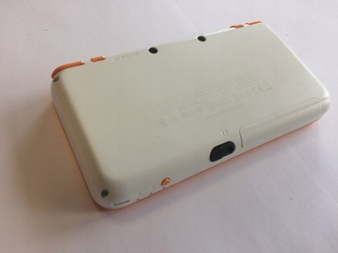 KONSOLA NEW NINTENDO 2DS XL BIAŁO-POMARAŃCZKOWA + RYSIK
