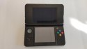 KONSOLA NEW NINTENDO 3DS CZARNA + 4 GRY ( W TYM 3 POKEMONY ) + RYSIK + ŁAD