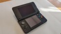 KONSOLA NEW NINTENDO 3DS CZARNA + 4 GRY ( W TYM 3 POKEMONY ) + RYSIK + ŁAD