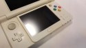 KONSOLA NEW NINTENDO 3DS + RYSIK + KARTA PAMIĘCI + ŁADOWARKA