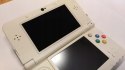 KONSOLA NEW NINTENDO 3DS + RYSIK + KARTA PAMIĘCI + ŁADOWARKA