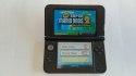 KONSOLA NINTENDO 3DS XL CZERWONO-CZARNA + GRA NEW SUPER MARIO BROS 2