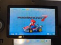 KONSOLA NINTENDO 2DS + KARTA PAMIĘCI + ŁAD + GRA MARIO KART 7