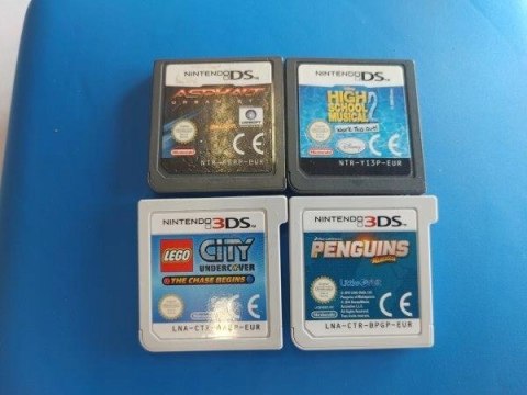 KONSOLA NINTENDO 2DS + RYSIK + KARTA PAMIĘCI + ETUI + 5 GIER KONSOLA NINTENDO 2DS + RYSIK + KARTA PAMIĘCI + ETUI + 5 GIER