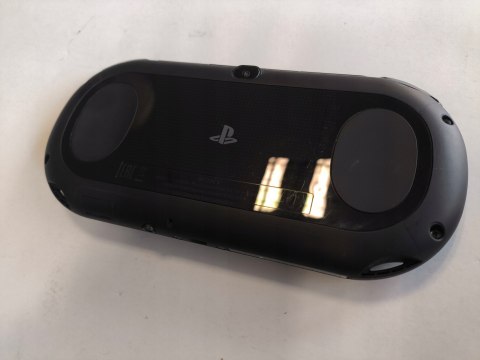 KONSOLA SONY PS VITA SLIM MODEL 2004 + ŁADOWARKA + PUDEŁKO + ETUI KONSOLA SONY PS VITA SLIM MODEL 2004 + ŁADOWARKA + PUDEŁKO + ETUI