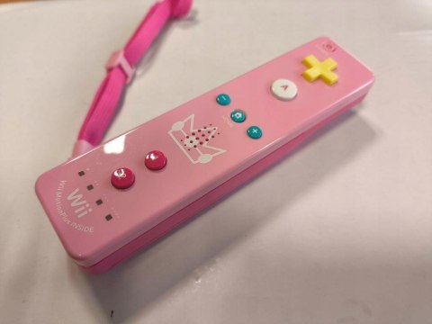 ORYGINALNY KONTROLER NINTENDO WII REMOTE PLUS - EDYCJA PEACH ORYGINALNY KONTROLER NINTENDO WII REMOTE PLUS - EDYCJA PEACH
