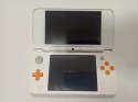 KONSOLA NEW NINTENDO 2DS XL POMARAŃCZOWO-BIAŁA + ŁAD + ETUI