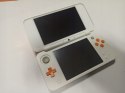 KONSOLA NEW NINTENDO 2DS XL POMARAŃCZOWO-BIAŁA + ŁAD + ETUI