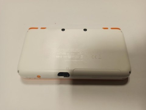 KONSOLA NEW NINTENDO 2DS XL POMARAŃCZOWO-BIAŁA + ŁAD + ETUI KONSOLA NEW NINTENDO 2DS XL POMARAŃCZOWO-BIAŁA + ŁAD + ETUI