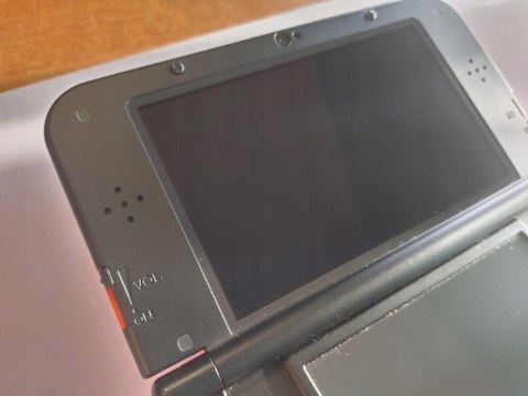 KONSOLA NEW NINTENDO 3DS XL POMARAŃCZOWO-CZARNA + GRA POKEMON MOON + ŁAD KONSOLA NEW NINTENDO 3DS XL POMARAŃCZOWO-CZARNA + GRA POKEMON MOON + ŁAD