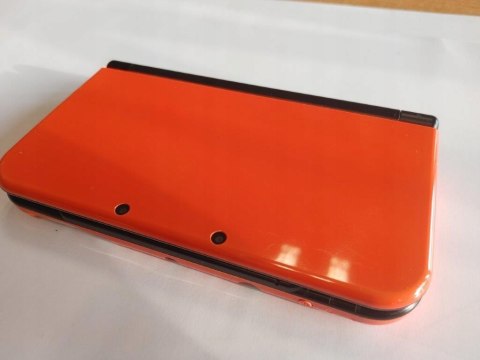KONSOLA NEW NINTENDO 3DS XL POMARAŃCZOWO-CZARNA + GRA POKEMON MOON + ŁAD KONSOLA NEW NINTENDO 3DS XL POMARAŃCZOWO-CZARNA + GRA POKEMON MOON + ŁAD