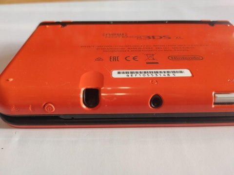 KONSOLA NEW NINTENDO 3DS XL POMARAŃCZOWO-CZARNA + GRA POKEMON MOON + ŁAD KONSOLA NEW NINTENDO 3DS XL POMARAŃCZOWO-CZARNA + GRA POKEMON MOON + ŁAD