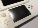 KONSOLA NEW NINTENDO 3DS + ŁADOWARKA + RYSIK + ETUI + GRA