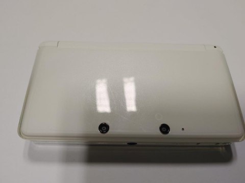 KONSOLA NINTENDO 3DS BIAŁA + ŁADOWARKA + RYSIK + KARTA PAMIĘCI + ETUI + ŁAD KONSOLA NINTENDO 3DS BIAŁA + ŁADOWARKA + RYSIK + KARTA PAMIĘCI + ETUI + ŁAD